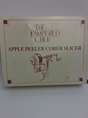 "The Pampered Chef" apple peeler/corer/slicer with clamp base and recipes